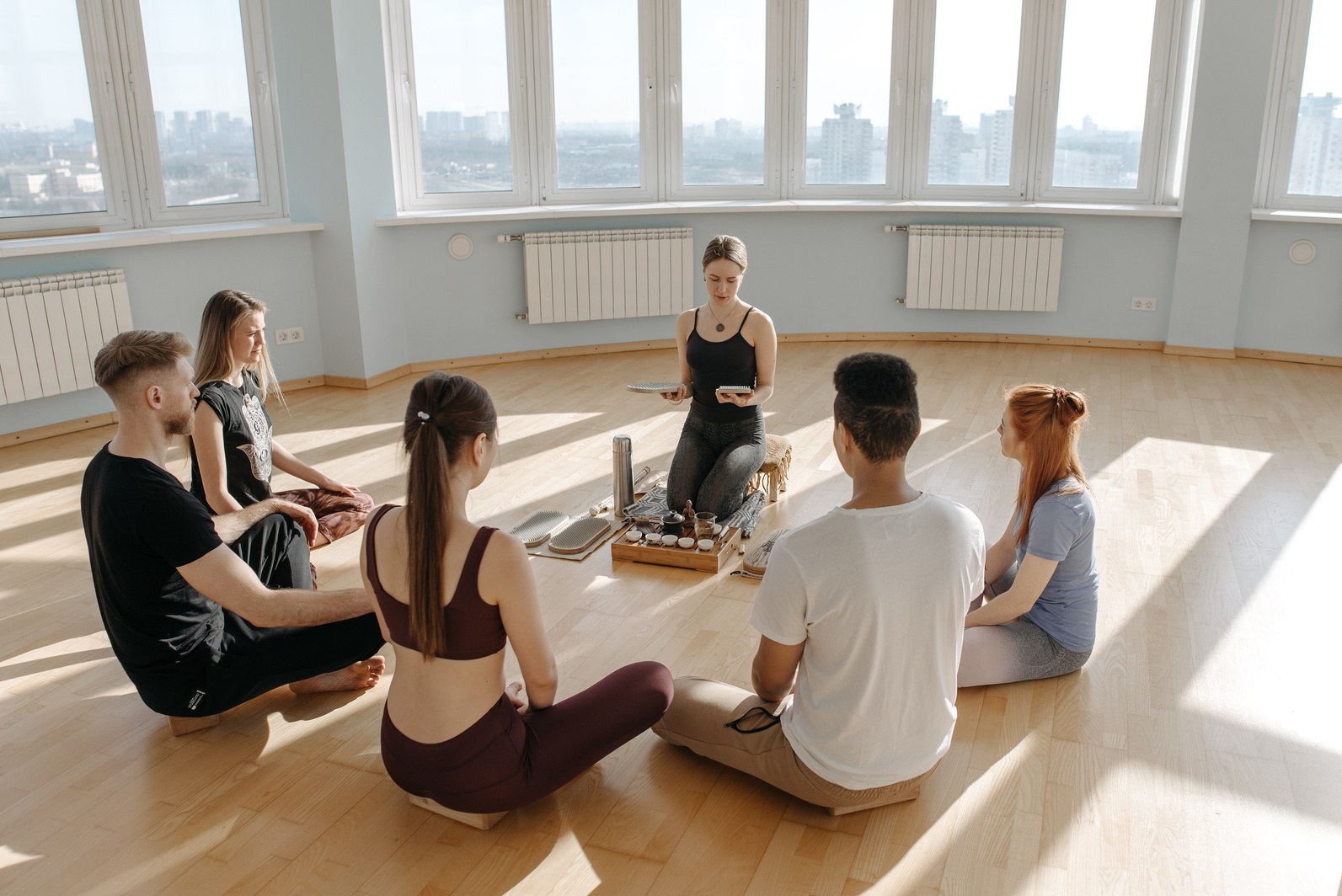 Group of People Having a Meditating Session 